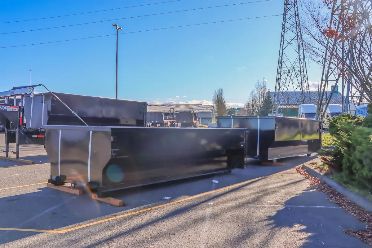 Roll-off dumpster ready for waste disposal at job site for Yard Waste Dumpster Rental in Berlin